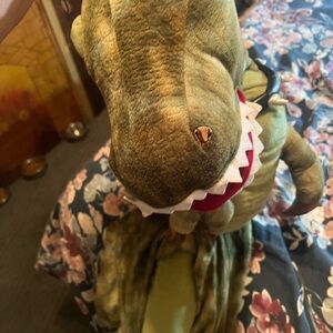 Charming Dinosaur Plush with Red Accents